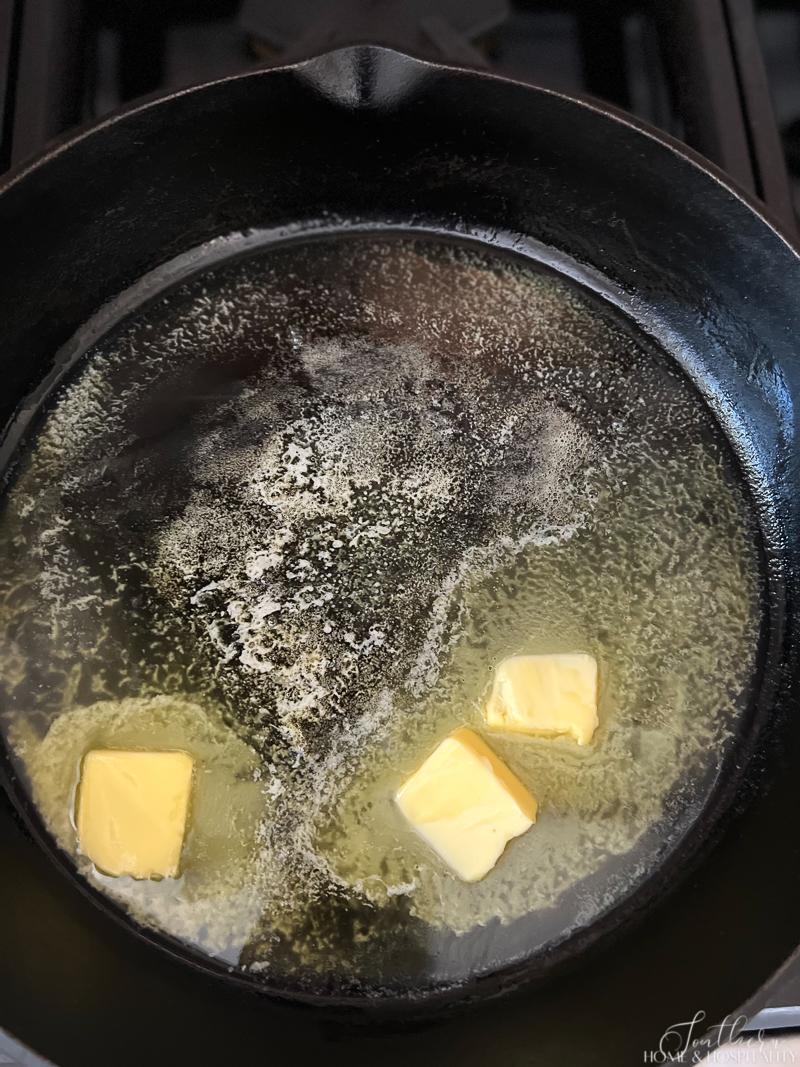 Butter melting in cast iron skillet
