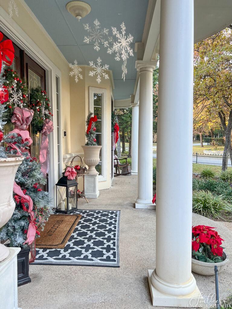Southern porch with columns decorated for Christmas