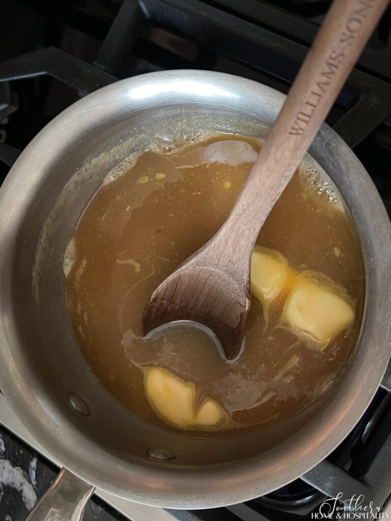 Melted butter, brown sugar, cream, corn syrup, and cinnamon in a saucepan