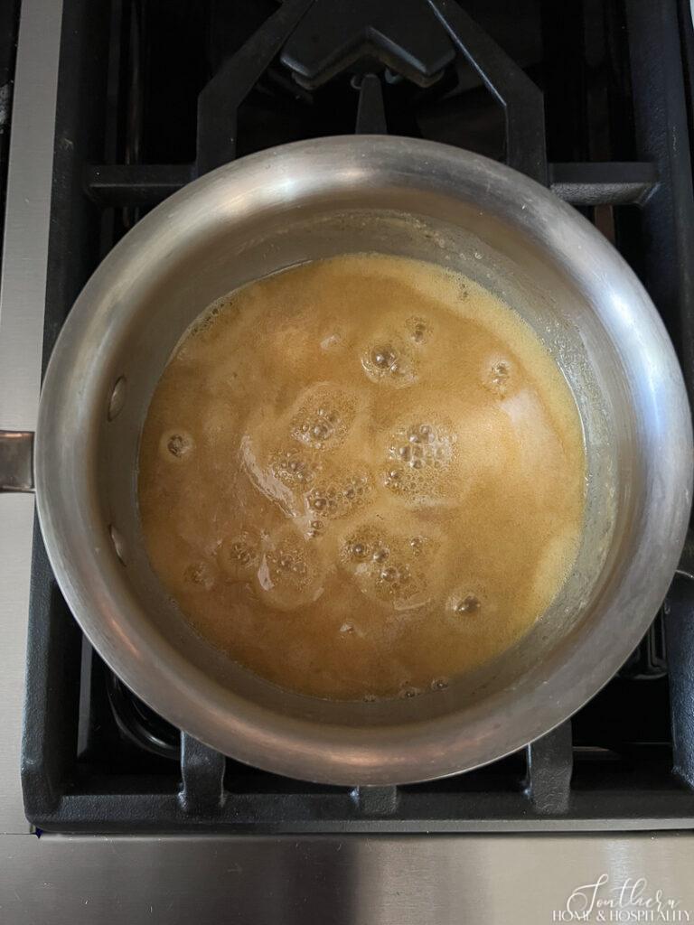 Bourbon cream sauce mixture bubbling