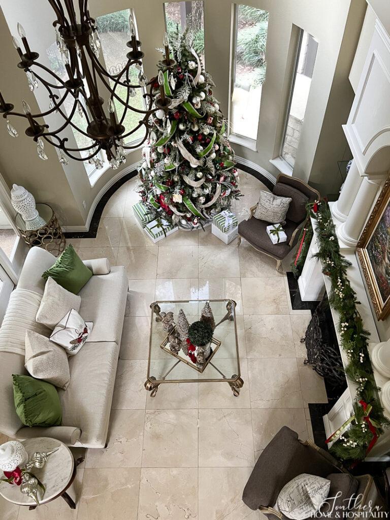 Green and white Christmas decor in living room