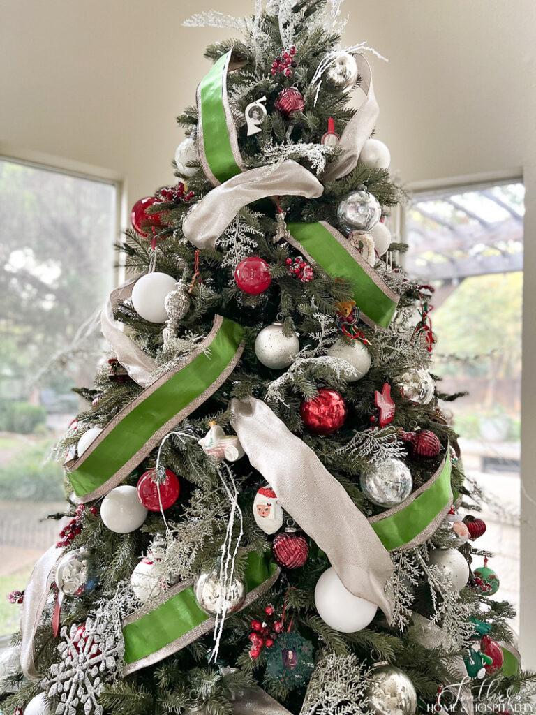 Green and gold ribbon on a Christmas tree