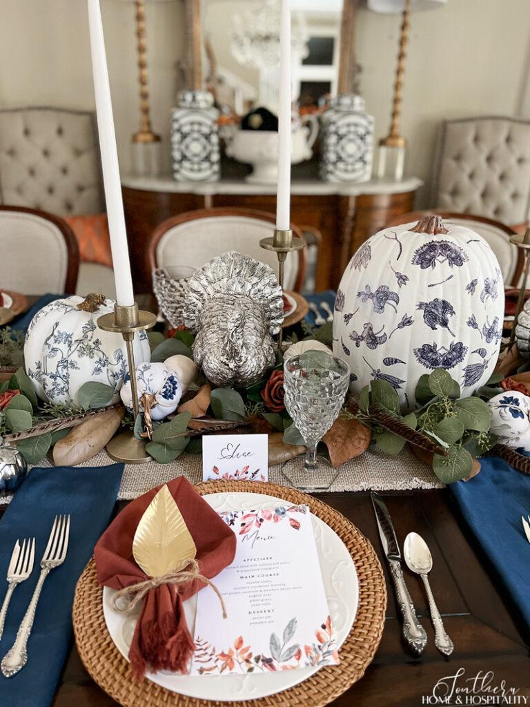 Thanksgiving place setting with blue and rust  and printable place cards and menu