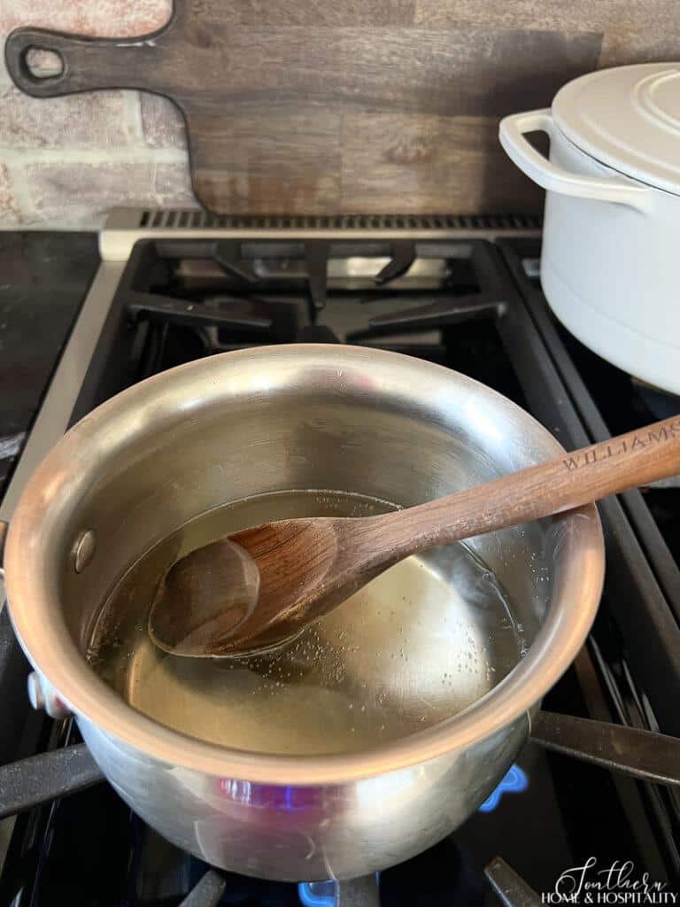 Making simple syrup in a saucepan