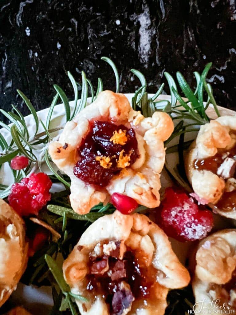 Cranberry and goat cheese tartlet with orange zest
