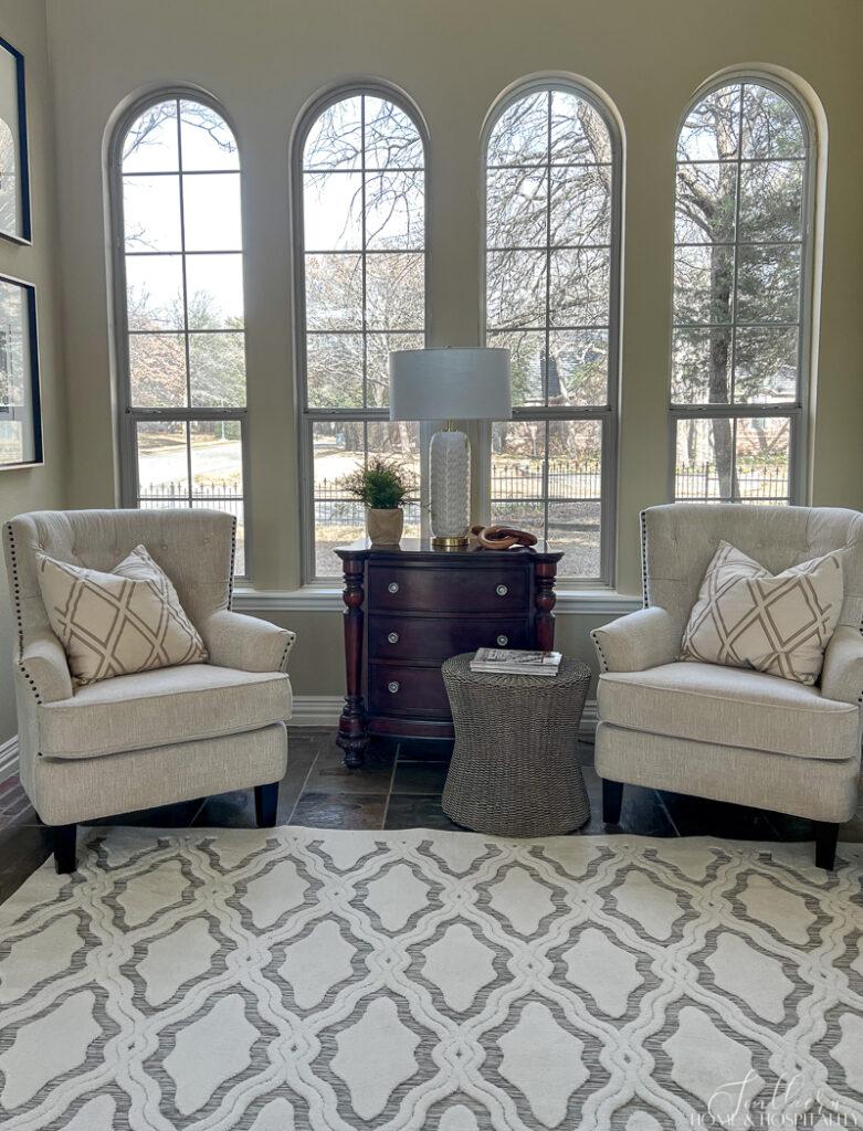 Area rug with chairs on edge