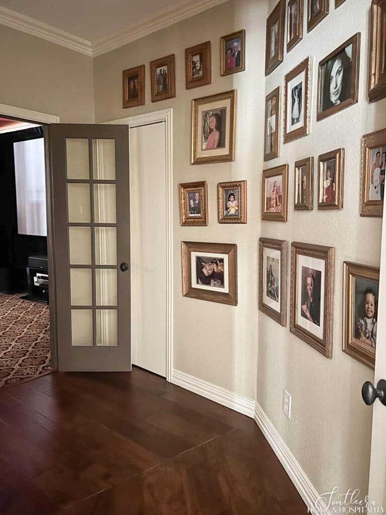 Gallery wall in hallway of family photos