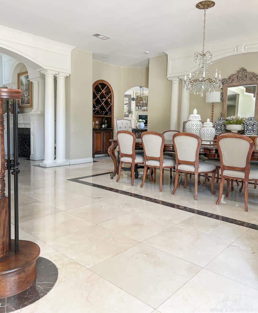 Open formal dining room in southern style home with marble inlay floor