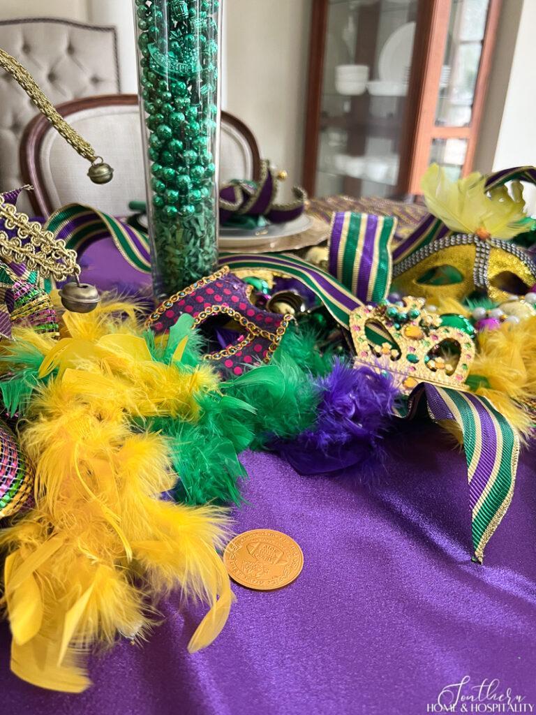 Doubloon on Mardi Gras theme tablescape