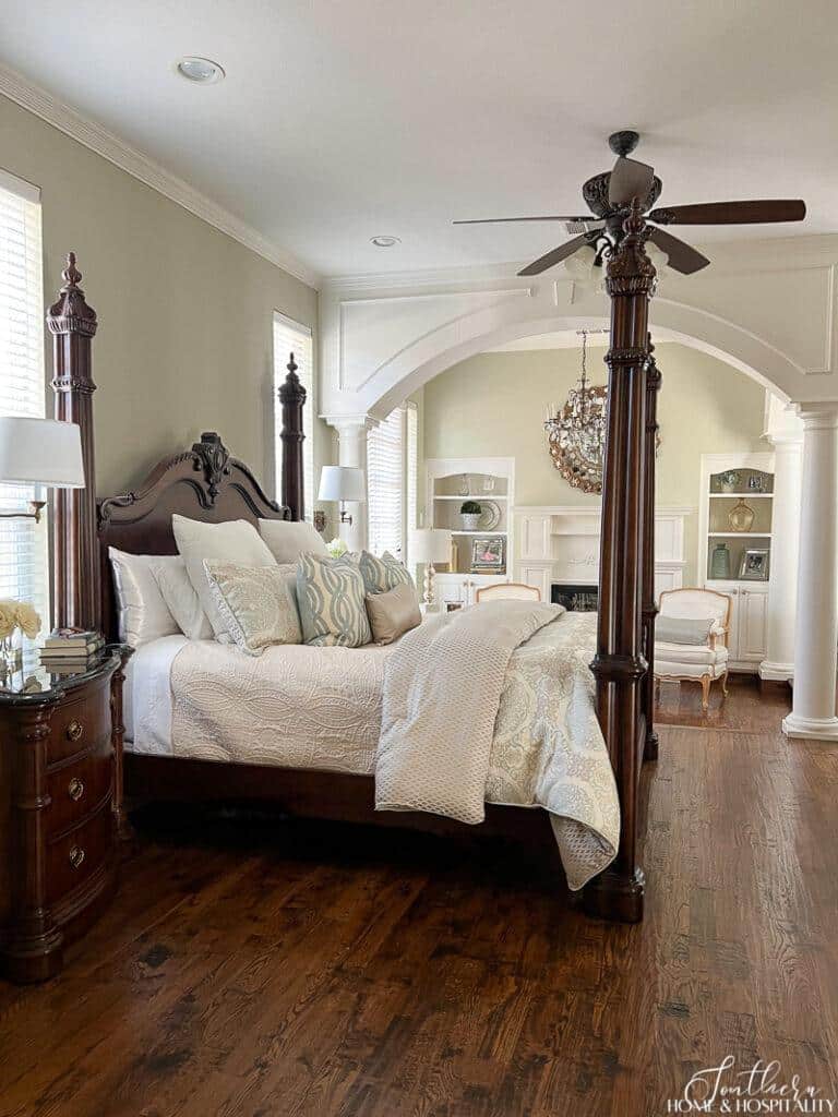 Southern style primary bedroom with four poster bed