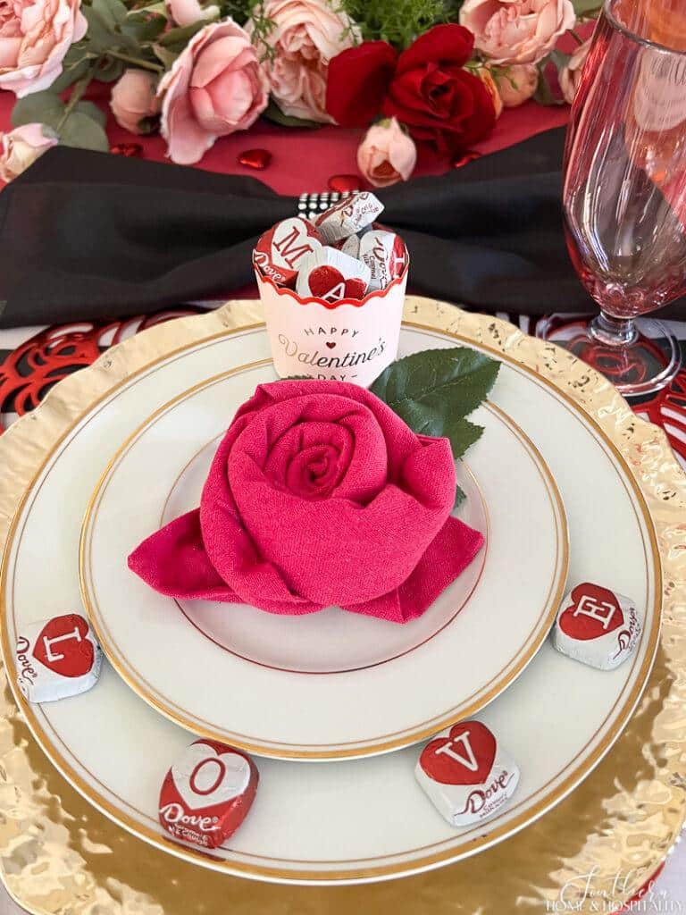 Pink rose napkin on Valentines Day place setting
