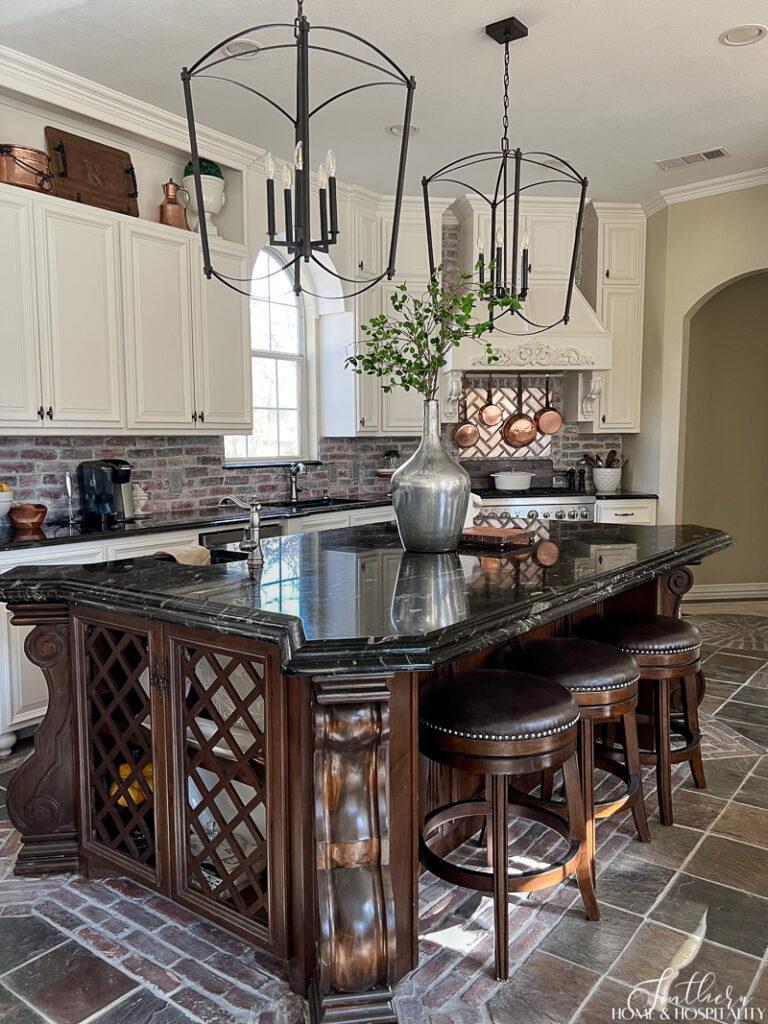 French country kitchen with furniture island