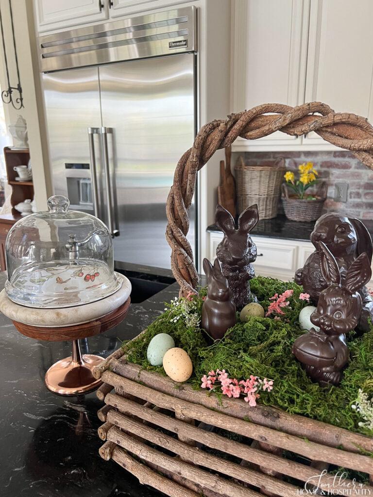 Easter basket centerpiece with faux chocolate rabbits