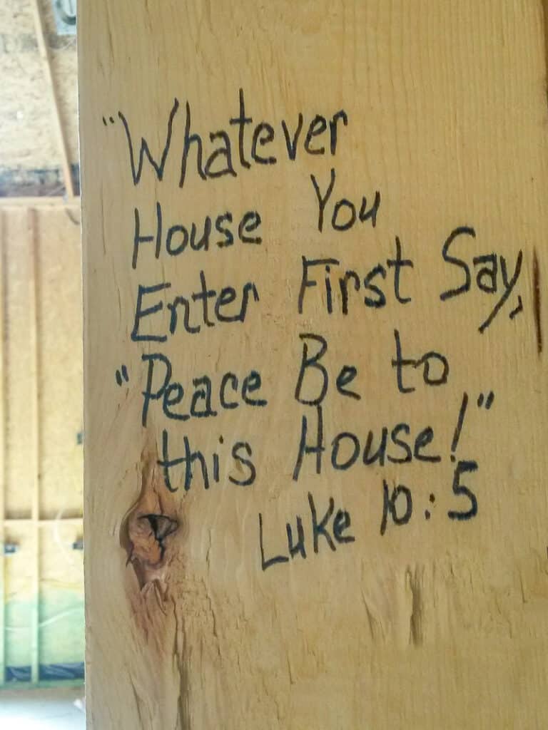 Bible verse written on house stud