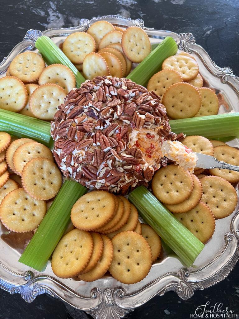 Southern pimento cheese ball on silver tray