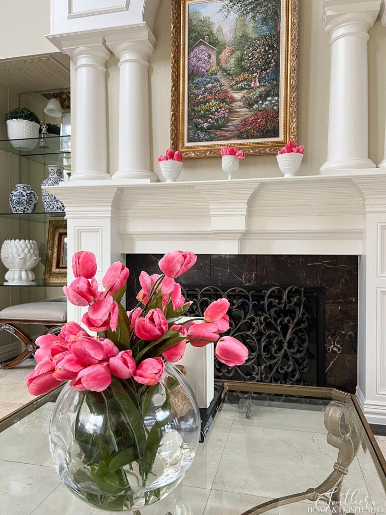 Pink tulips on coffee table and mantel for spring