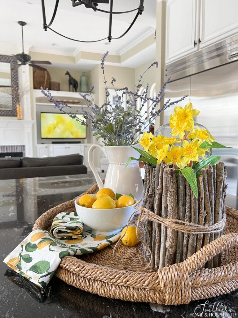 Yellow spring kitchen decor with lemons and daffodils