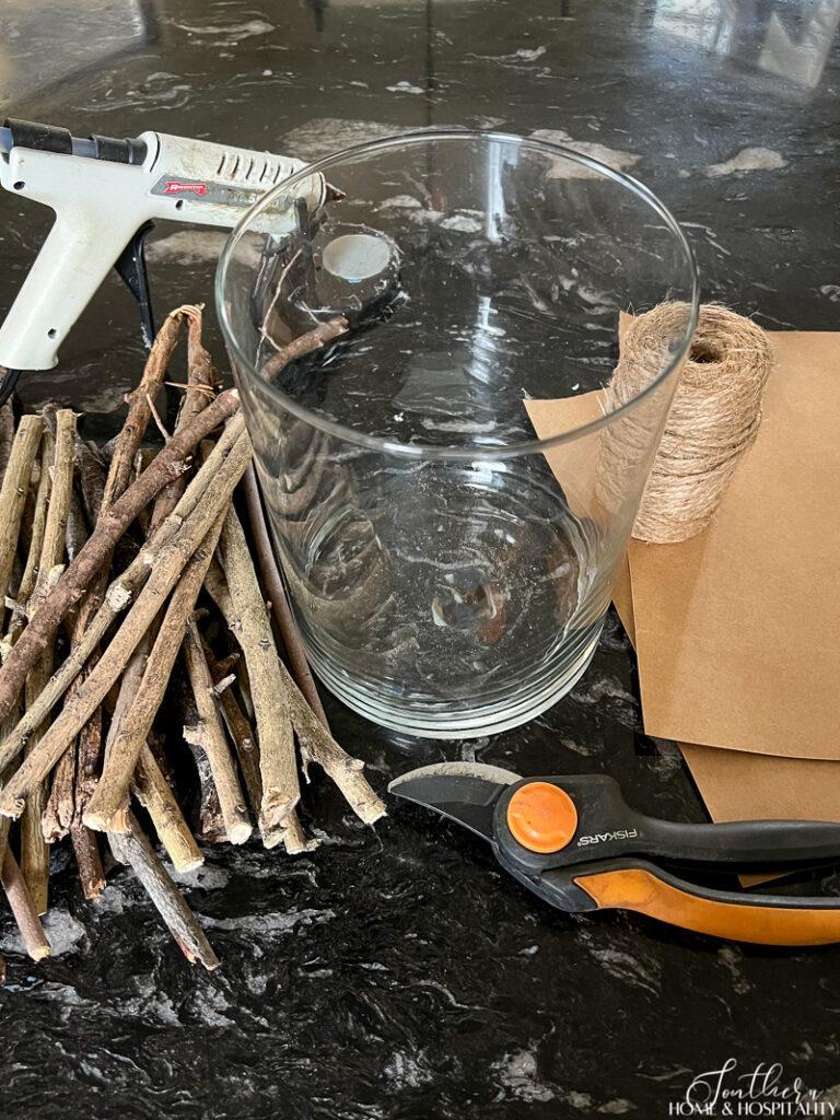 Supplies to make a DIY twig vase