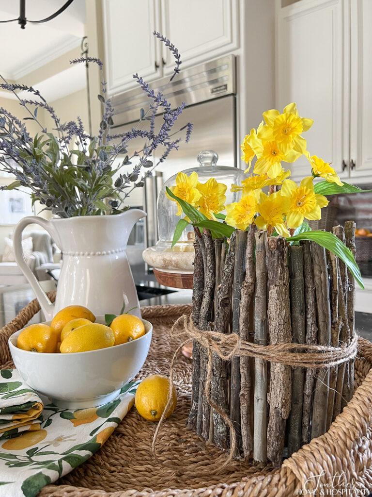 DIY rustic twig vase with daffodils