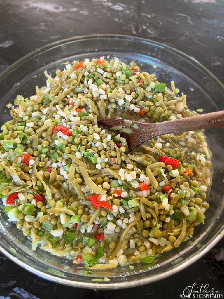 Retro vegetable salad with peas, green beans, corn, and pimentos