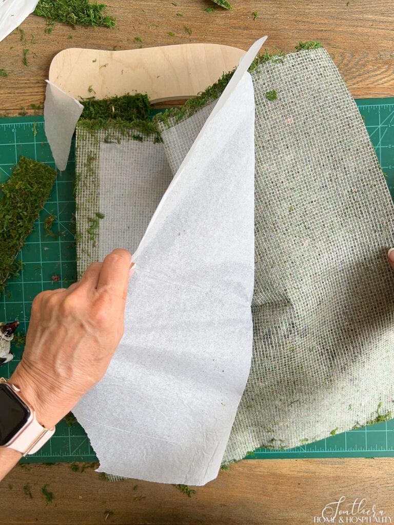 Peeling the back off of moss mat