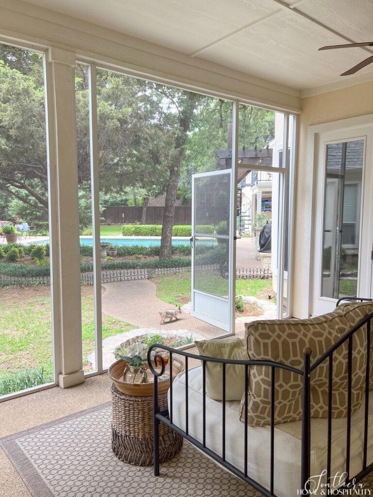 Screened patio with couch bed