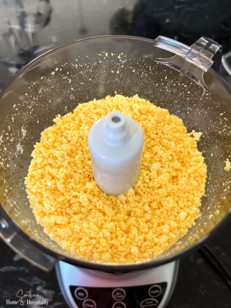 Chopped egg yolks in food processor