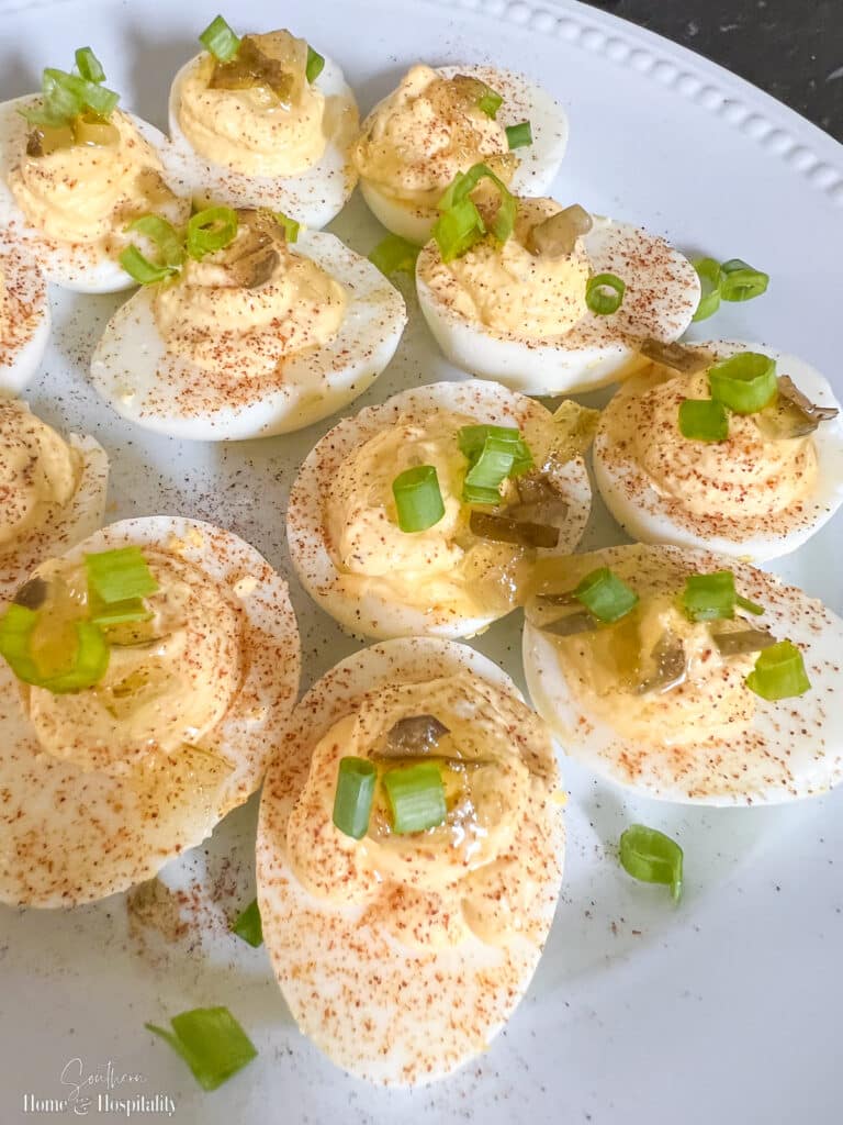 Deviled eggs with paprika and scallions