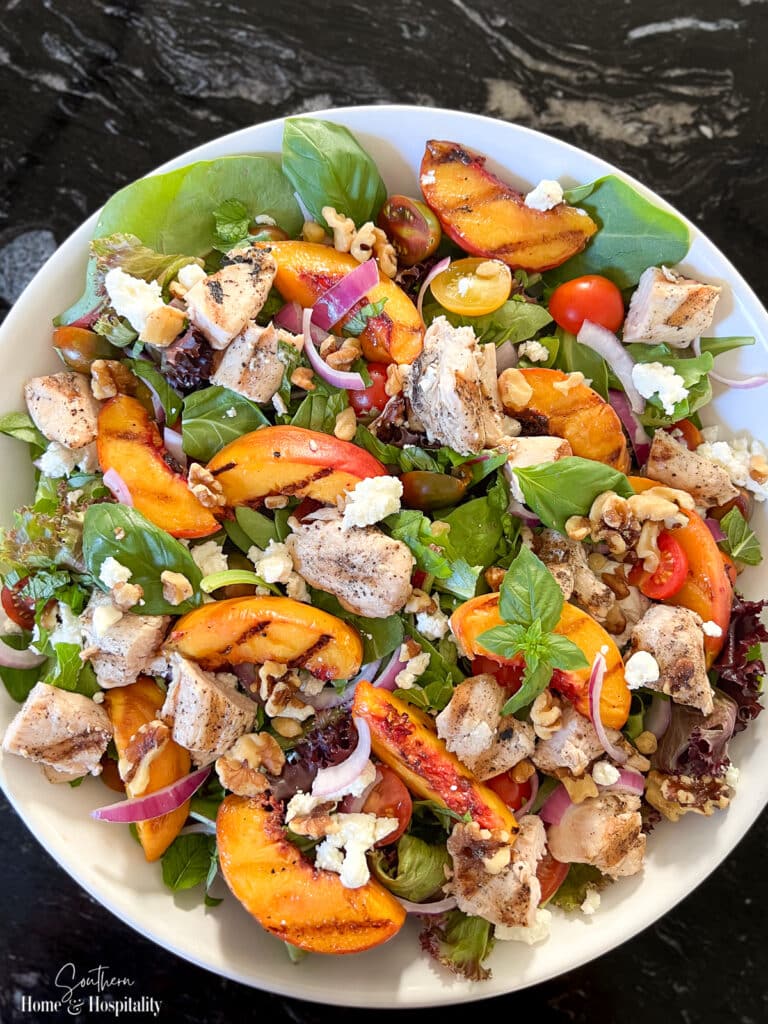 Grilled Peach Salad with Chicken, Goat Cheese, Basil, Mint, and Balsamic Vinaigrette