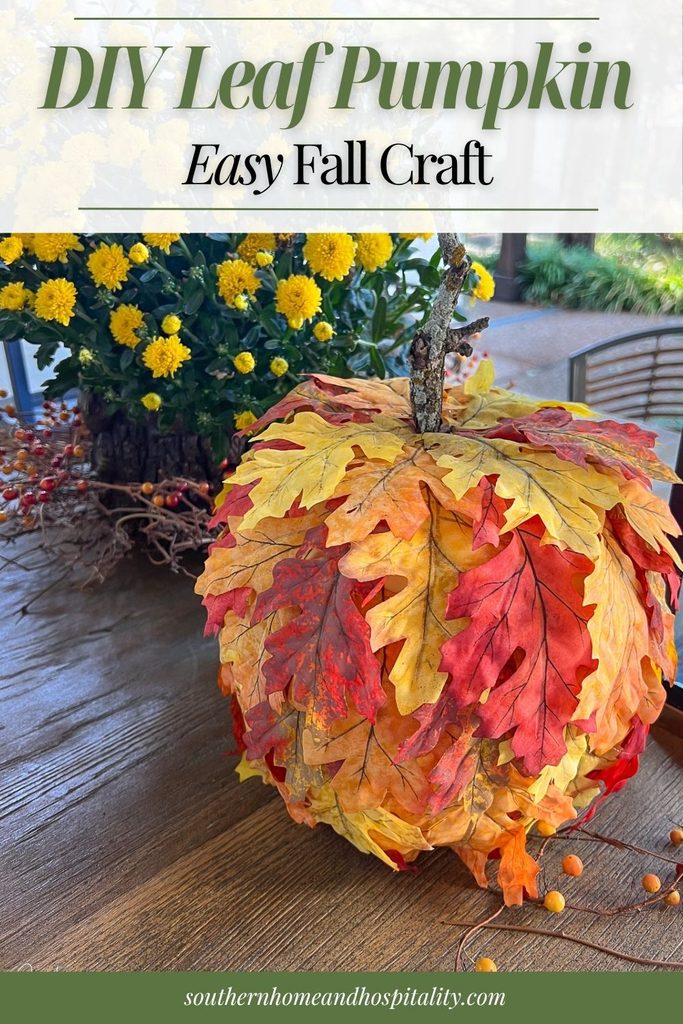 DIY leaf pumpkin covered with layered red, orange, and yellow faux fall leaves for an easy autumn craft.