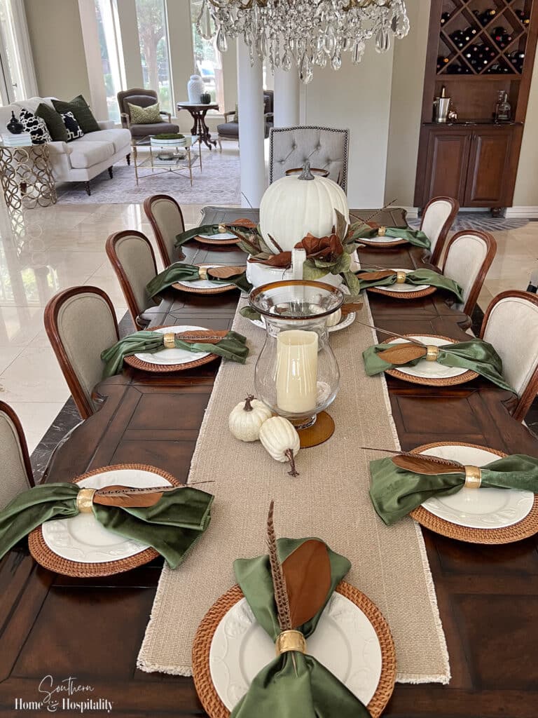 Fall table setting with green, brown, and white