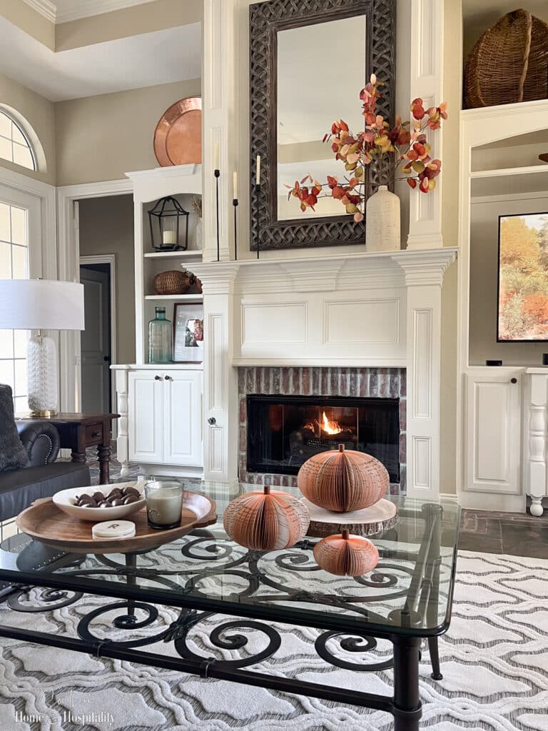 Fall coffee table styling with book page pumpkins