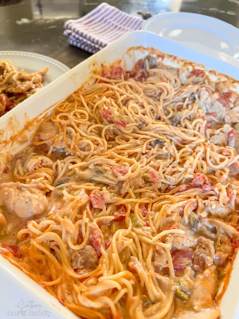 Chicken spaghetti with rotel tomatoes, mushrooms, and cheese
