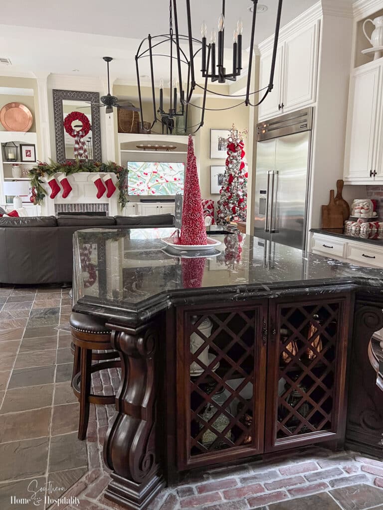 Kitchen and family room with red cozy Christmas decorations