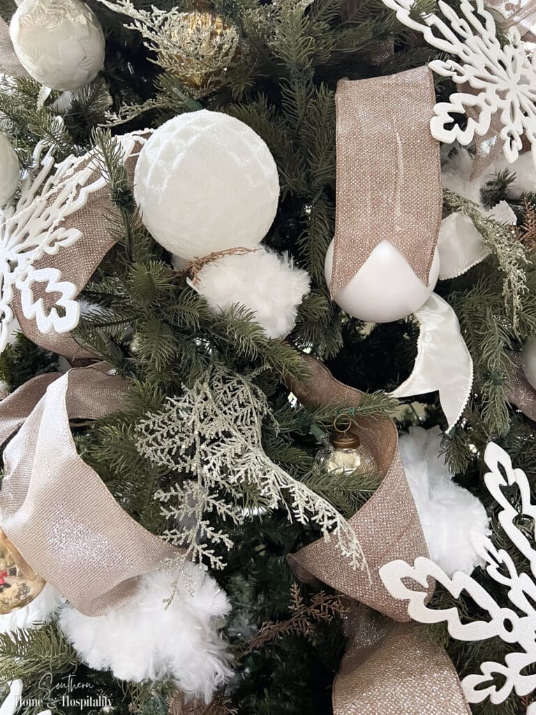 White dusters in Christmas tree for faux snow