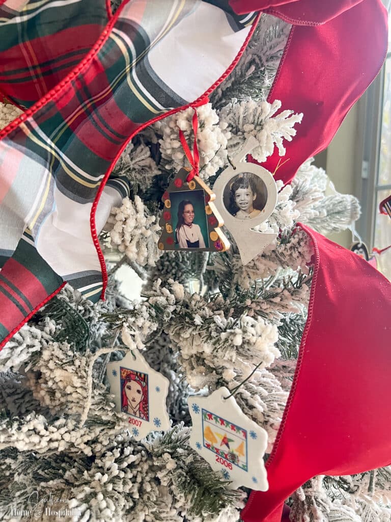 Photo ornaments from school on Christmas tree