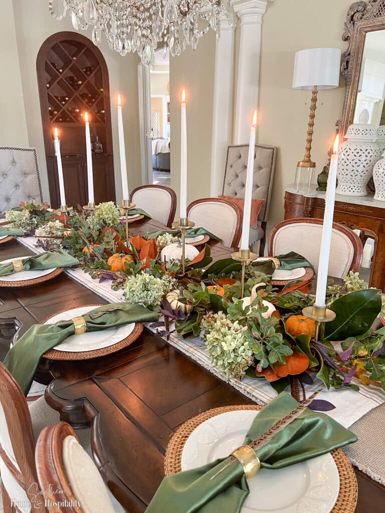 Thanksgiving table with real leaves and pumpkins