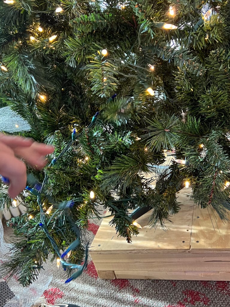 How to put lights up into the tree