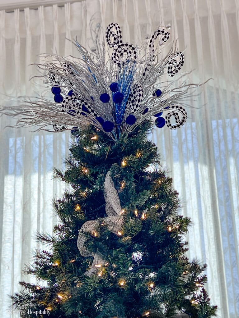 Blue, black, and white tree topper with picks
