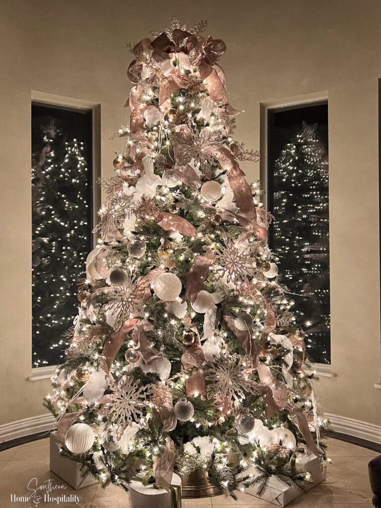 Gold and white Christmas tree at night