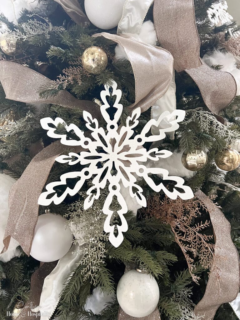 Oversized snowflake ornaments on Xmas tree