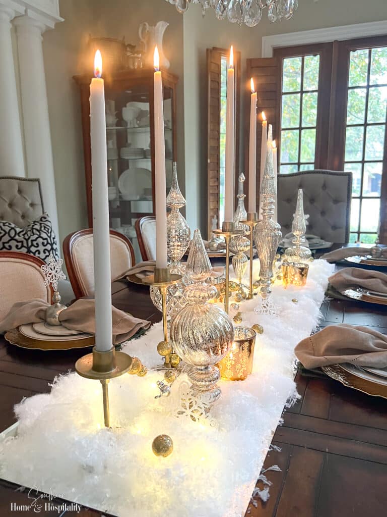 White and gold Christmas centerpiece with snow