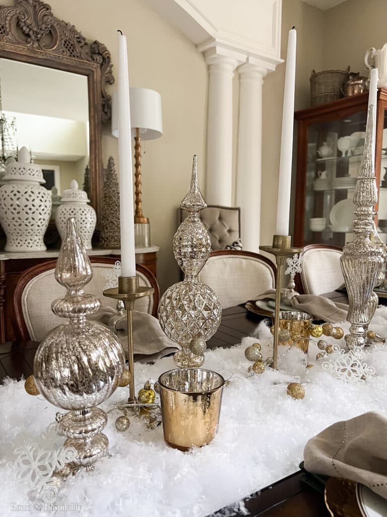 Mercury glass and snow in white and gold holiday table decor