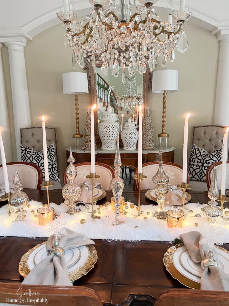 Gold and white Christmas table decorations with mercury glass finials