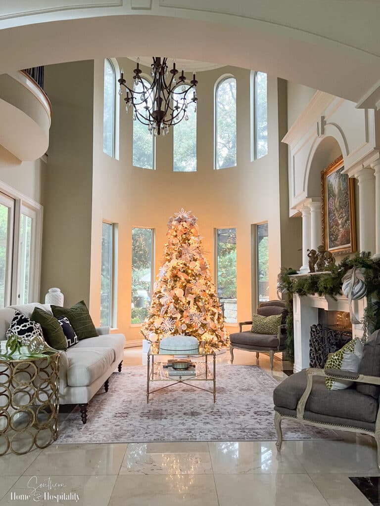 Living room decorated with white and gold for Christmas