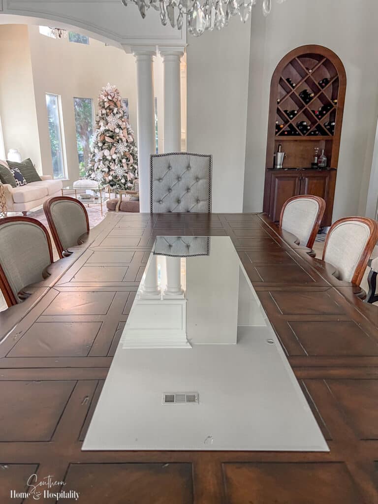 Mirror as table runner on a dining table
