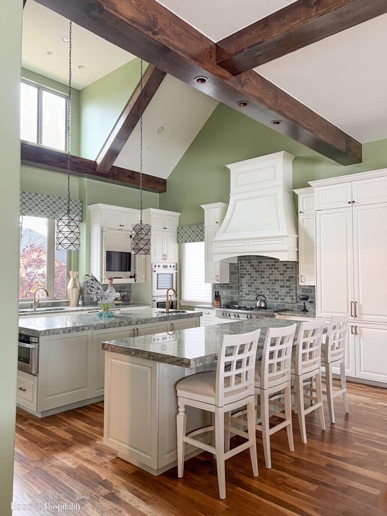 Dream luxury kitchen design with vaulted beam ceilings and double islands
