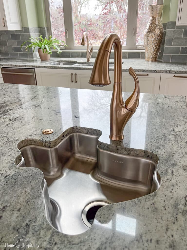 Texas shape utility sink with garbage disposal in kitchen