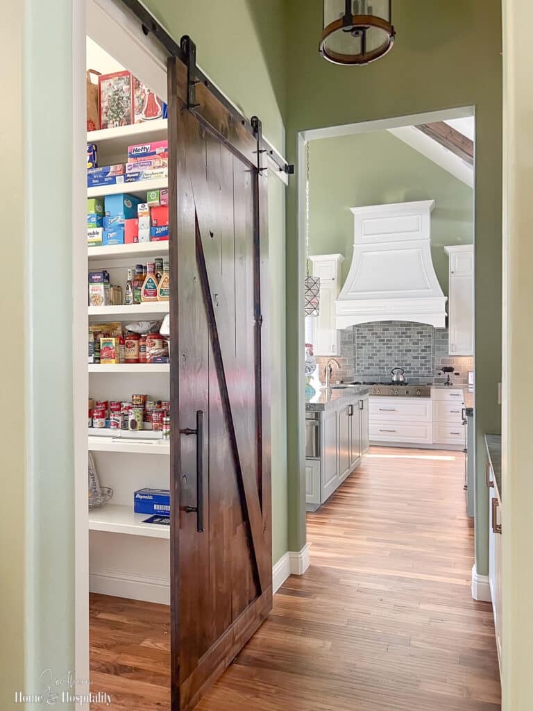 Smooth stained wood pantry sliding barn door