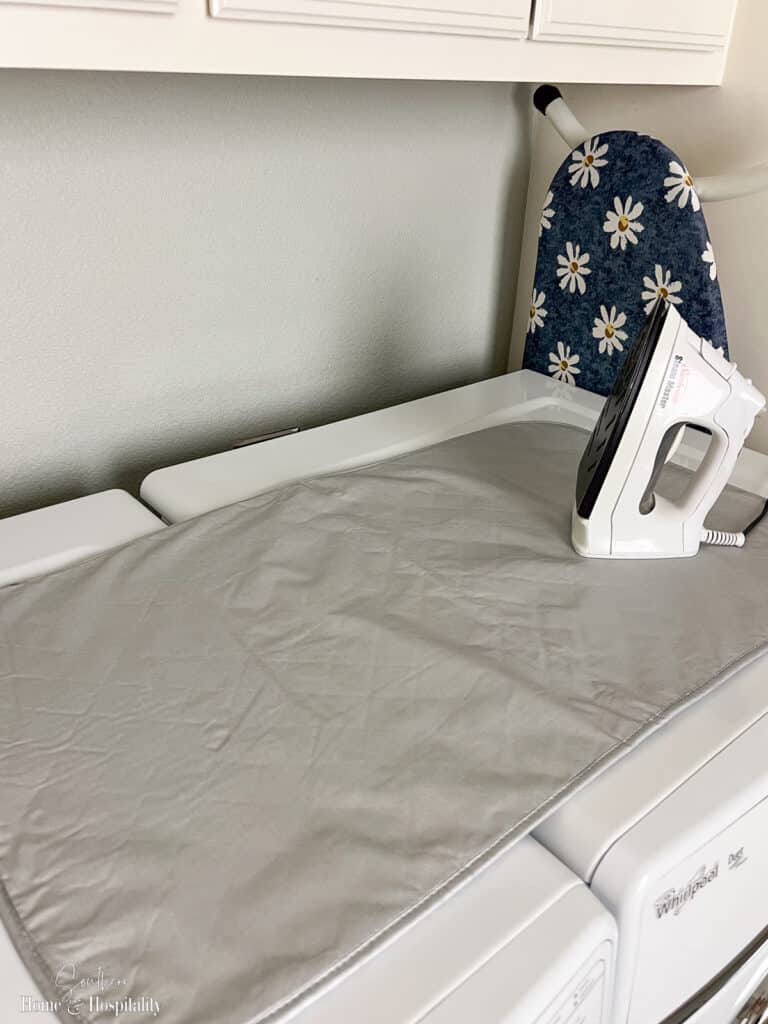 Magnetic ironing mat on top of washer and dryer